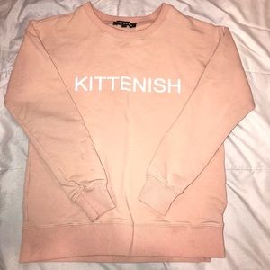 Kittenish peach sweater